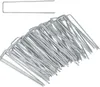 A pile of metal tent stakes on a white background. Produktbild-Vorschau