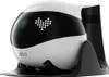 A white and black robot companion on a black charging stand against a white background. Produktbild-Vorschau