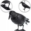 A collage of images showing a black plastic crow decoy, with close-up views of its feet and how it can be hung. Podgląd zdjęcia produktu