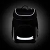 A black ergobag backpack with reflective strips is shown against a dark, gradient background. Produktbild-Vorschau