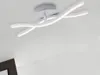 A modern LED ceiling light with two curved arms, mounted on a white ceiling. Produktbild-Vorschau