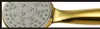 A close-up of a gold-colored shower head with a silver faceplate and green water jets. Produktbild-Vorschau