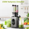 A slow juicer is shown in operation, with fruits and vegetables in the background, and juice being dispensed into a glass. Produktbild-Vorschau