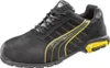 A single black and yellow Puma safety shoe is shown against a white background. Voir les images du produit