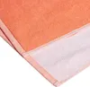 A close-up view of a folded coral-colored towel with a pink border. Produktbild-Vorschau