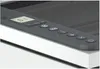 A close-up view of the control panel and top surface of a printer. Podgląd zdjęcia produktu