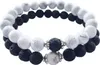 Schmuck für Paare - Weiße und schwarze Armbänder aus Produktbild-Vorschau 1