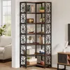 A corner bookshelf filled with decorative items and books, set in a living room with a couch visible in the background. Anteprima dell’immagine prodotto