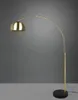 A brass arc floor lamp with a black marble base against a gray background. Anteprima dell’immagine prodotto