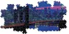 A jigsaw puzzle of New York City at night, featuring the Brooklyn Bridge and city skyline. Podgląd zdjęcia produktu