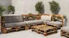 An outdoor lounge area with furniture made from wooden pallets. Produktbild-Vorschau