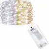 A coiled string of LED lights with a battery pack. Voir les images du produit