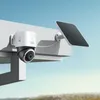 A security camera with a solar panel attached to the side of a building. Náhľad obrázku produktu