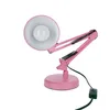 A pink desk lamp with an adjustable arm and a light bulb inside. Anteprima dell’immagine prodotto