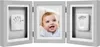 A triptych photo frame with a baby's photo in the center and handprints on either side. Podgląd zdjęcia produktu