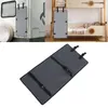 A gray protective pad with straps is shown hanging on the side of a bunk bed and also attached to the side of an RV. Náhled obrázku produktu