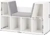 A white wooden bookshelf with gray cushions, featuring multiple storage compartments and dimensions indicated by measurement lines. Podgląd zdjęcia produktu