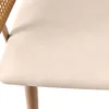 A close-up view of a chair's seat and part of its rattan back. Produktbild-Vorschau