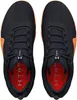 A top-down view of a pair of black and orange Under Armour sports shoes. Anteprima dell’immagine prodotto