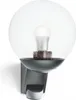A close-up studio shot of a white LED outdoor sensor light with a clear, speckled globe. Anteprima dell’immagine prodotto