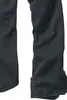A close-up view of the bottom of a black long-sleeved shirt. Produktbild-Vorschau