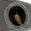 A close-up view of a cat house with a dangling feather toy inside. Produktbild-Vorschau