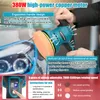 A person is holding a teal and black car polisher with an orange polishing pad. Produktbild-Vorschau