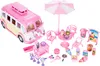 A toy camper van and accessories are displayed on a white background. Náhľad obrázku produktu