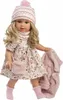 A doll dressed in winter clothing, holding a blanket. Anteprima dell’immagine prodotto