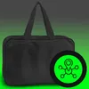 A black bag with a green and black circular graphic overlay. Podgląd zdjęcia produktu