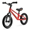 A red balance bike on a white background. Náhled obrázku produktu