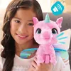 A young girl is holding a pink toy unicorn with wings. Náhled obrázku produktu