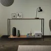 A console table with decorative items on it, placed in a room. Náhled obrázku produktu