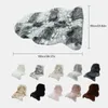 A large faux fur rug with a grey and white pattern is shown at the top, with dimensions indicated. Below it, a collage of smaller faux fur rugs in various colors is displayed. Náhled obrázku produktu