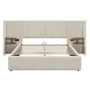 A beige upholstered bed frame with a headboard and two attached wooden nightstands, shown from the front with the mattress support slats visible. Náhled obrázku produktu