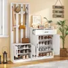 A white entryway furniture set with a coat rack, shoe storage, and a bench, decorated with a sign and a plant. Produktbild-Vorschau