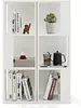 A white cube-shaped bookshelf with various items on its shelves. Produktbild-Vorschau