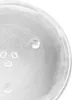 A close-up view of a clear glass turntable plate for a microwave. Náhľad obrázku produktu