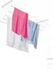 A ceiling-mounted clothes dryer with laundry hanging on it. Anteprima dell’immagine prodotto