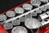 A close-up view of a set of socket wrenches and a ratchet in a red toolbox. Produktbild-Vorschau