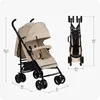 A beige baby stroller is shown in two views: unfolded and folded, with dimensions indicated by measurement lines and text. Voir les images du produit