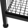 Close-up of the black metal leg and wire shelf of a small table. Náhled obrázku produktu
