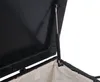 A close-up view of the open lid of a storage box, showing a gas strut mechanism. Náhled obrázku produktu