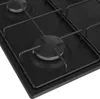 A close-up, angled view of a black gas stovetop with four burners and black grate supports. The focus is on the burners and the surface of the stovetop. Produktbild-Vorschau