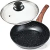 A frying pan with a glass lid, shown from a slightly elevated angle against a white background. Náhled obrázku produktu
