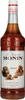 A bottle of Monin Caramel syrup. Produktbild-Vorschau