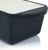 A close-up view of the corner of a black cast iron baking dish with a white interior. Produktbild-Vorschau