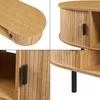 A collage of four close-up images showing different angles and details of a wooden coffee table with black metal legs and a slatted door. Anteprima dell’immagine prodotto