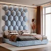 A modern bedroom with a large hexagonal headboard and a bed. Anteprima dell’immagine prodotto
