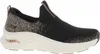 A side view of a black Skechers Arch Fit D'Lux women's sneaker with rose gold accents. Náhled obrázku produktu